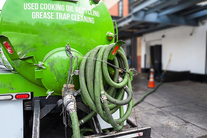 licensed technician pumping a grease trap in Reynoldsville PA